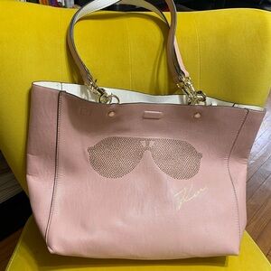 Karl Lagerfeld pink tote with studded gold sunglasses design & signature.